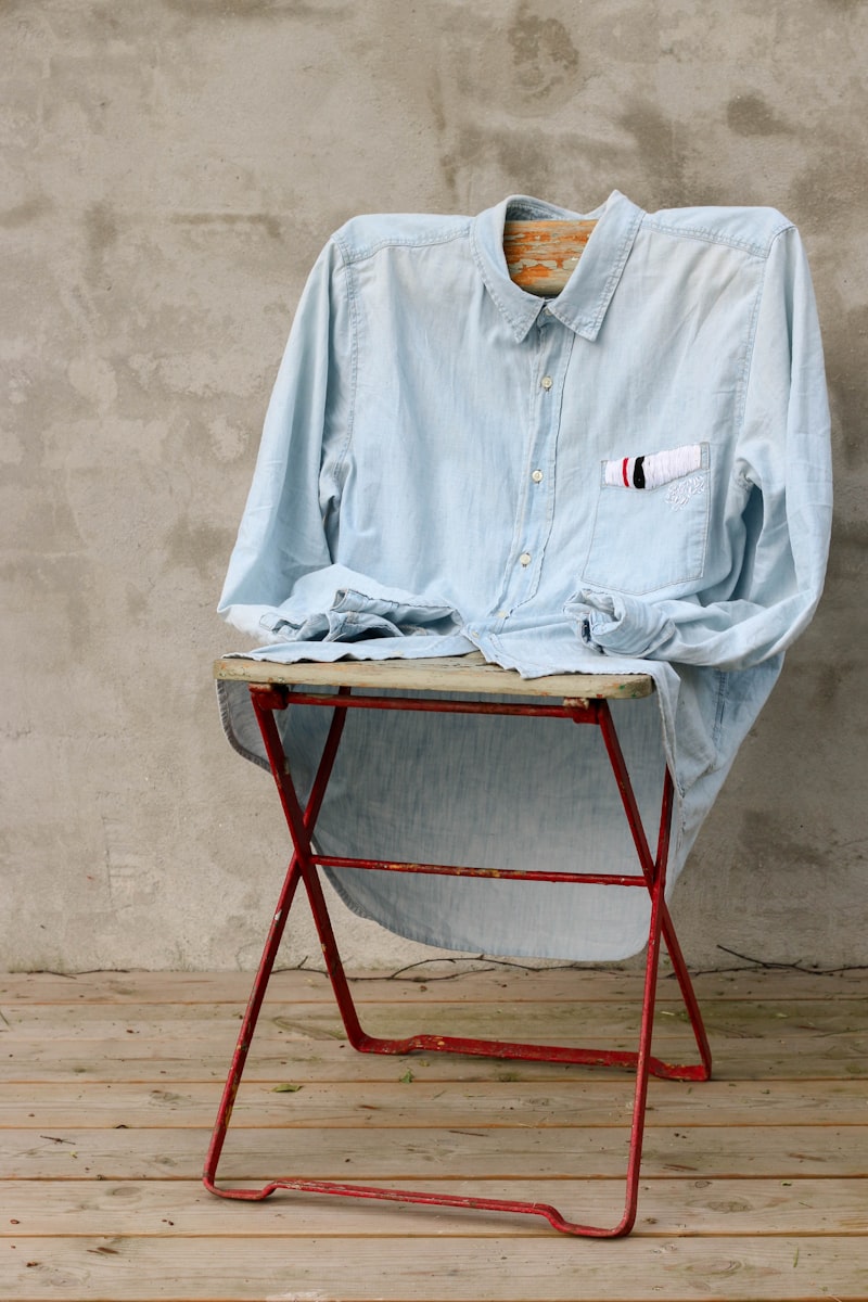 Everyday essentials — neutral tops and relaxed fits on wooden hangers